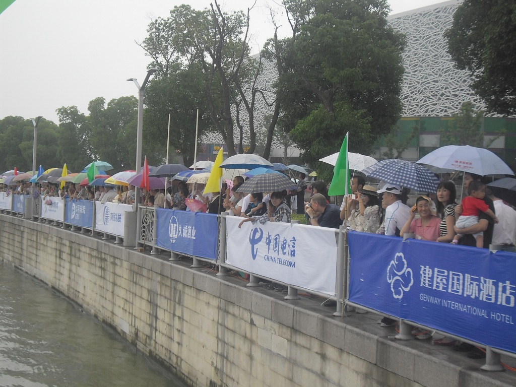 Lots of people watching the boats Lots of people watching the boats